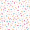 Colorful confetti sprinkles seamless pattern.
