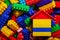 A colorful constructor set with the little house made from designer blocks close-up