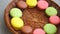 Colorful cookies in the wicker plate