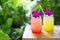 Colorful cool drink in summer on nature background