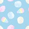 Colorful cotton candy on blue background. Sweets seamless pattern.