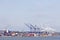 Colorful cranes and containers in new jersey harbor