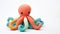 Colorful Crocheted Octopus Toy On White Background