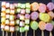 Colorful cube and circle soft candies on skewers