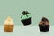 Colorful cupcake on green background, idea minimal concept for new year and christmas holliday