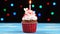 Colorful cupcake with single birthday candle