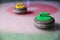 Colorful curling stones on ice