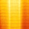 Colorful curved sheets of paper shaped like a fan, on orange background