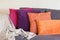 Colorful cushion on sofa cozy home autumn