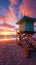 Colorful dawn Lifeguard tower, South Beach shoreline, and azure sky paint Miami\\\'s beauty