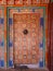 Colorful decorated closed door at Drepung monastery, Lhasa, Tibet, China