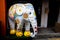 Colorful decorative statue of an elephant painted with Singapore map and oriental ornaments in front of the cafe in hip Haji Lane