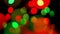 Colorful defocused blinking bokeh festive lights as abstract background
