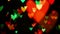 Colorful defocused blinking heart bokeh festive lights as abstract background.