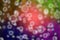 colorful defocused maple leaves bokeh with bubble, abstract