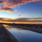 Colorful Desert Sunrise Mirror Refection On Water