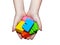 Colorful designer in children`s hands isolated