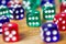 Colorful dices background on wood