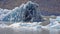 Colorful Dirty Ice on a Glacial Lake