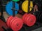 Colorful Disks for Barbell in Gym: Weight Fitness Equipment