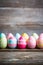 A Colorful Display of Painted Eggs on a Rustic Wooden Table