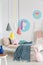 Colorful, diy ice cream cones pendant lamps in the foreground an