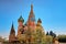 Colorful domes of the St. Basil`s Cathedral on a spring sunny day with blue sky. Red square in Moscow, capital of Russia