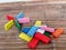 colorful domino blocks on a brown bamboo table