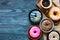 Colorful Donuts breakfast composition with different color styles