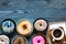 Colorful Donuts breakfast composition with different color styles