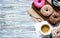 Colorful Donuts breakfast composition with different color styles