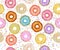 Colorful donuts seamless pattern, isolated on white.  Sweets background. Watercolor illustration