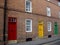 Colorful doors brick building