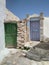 Colorful doors at entrance to village houses on the pretty Greek holiday island of Amorgos