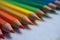 Colorful drawing pencils arranged diagonally