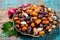 Colorful dried different types of beans legumes in bowl