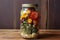 colorful dried flower arrangement in a glass jar