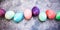 Colorful dyed easter eggs in a line, topview, greeting easter ca