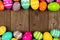 Colorful Easter double border against a rustic wood background