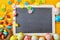 Colorful Easter egg frame around a school slate