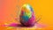 Colorful easter egg with paint splash background