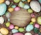 Colorful easter egg on wood background