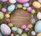 Colorful easter egg on wooden background