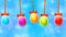 Colorful Easter eggs on blue abstract background