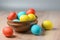 Colorful Easter eggs in brown pottery. Easter eggs are a symbol and a mandatory attribute of Easter