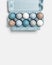 Colorful Easter eggs in carton packing, blue, beige, white neutral colors, festive chicken egg in paper container on