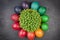 Colorful easter eggs and cress - top view