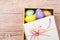 Colorful Easter Eggs decorated in beautiful giftbox