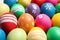 Colorful Easter eggs with different patterns as background