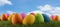 Colorful Easter eggs green grass sky clouds horizon 3d-illustration